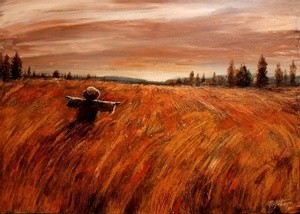 scarecrow in the field at sunrise