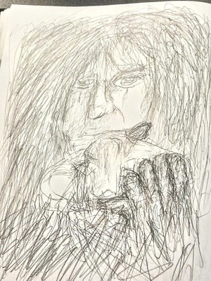 Alice Cooper with a slithering friend (a snake)