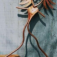AL  