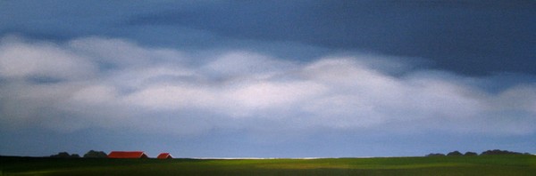 Red roofs, a dyke and a sky