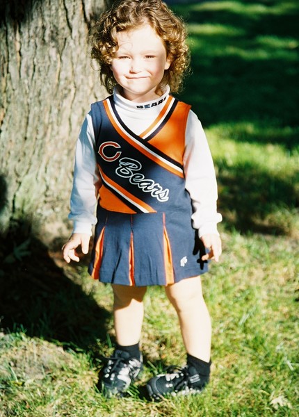 The family's little cheerleader.