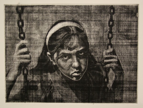 Young Girl Sitting on a Swing