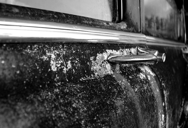 Rusted Door Meets Sleek Door Handle