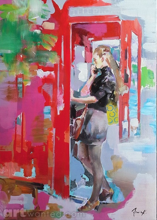 Girl in a red phone booth