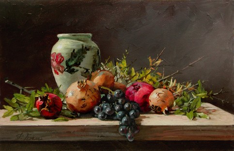 pomegranates with a white vase