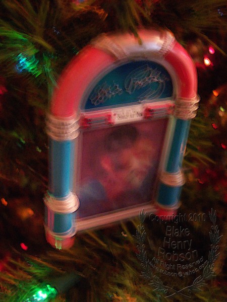 Christmas tree, ornaments, tinsel & colorful light