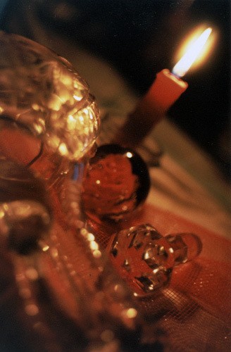Glass and candle
