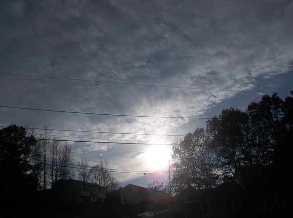 sunset through clouds