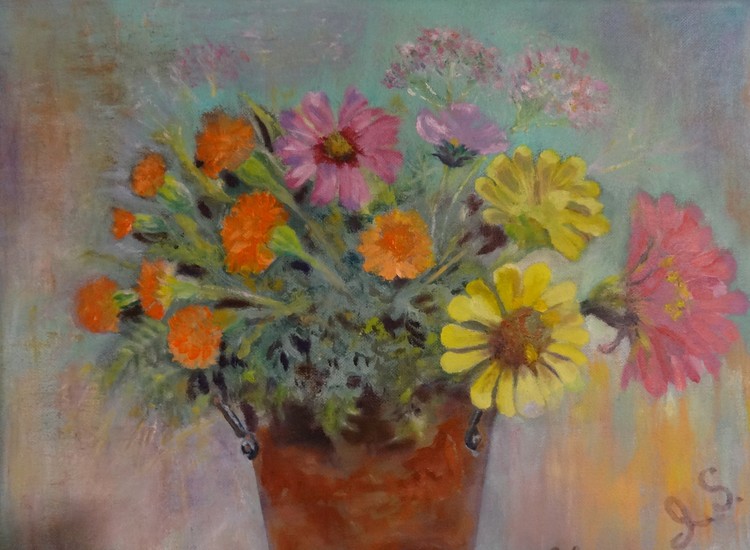 Fall flowers in rusty bucket