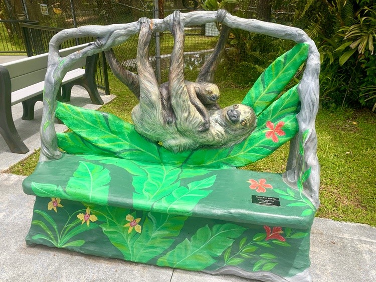 Mama and baby sloth bench