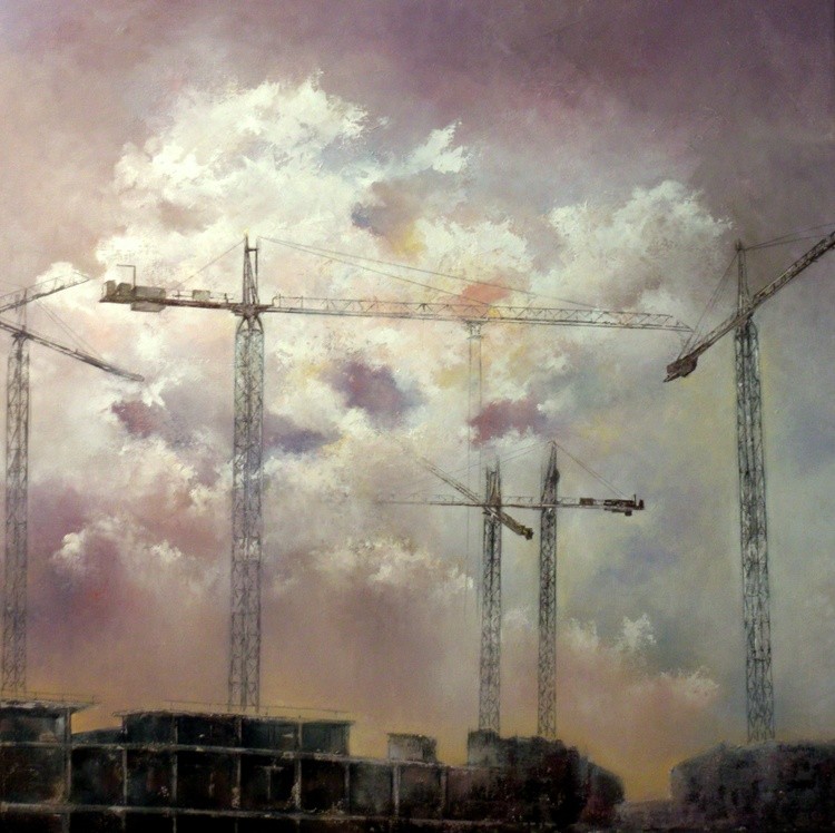 Grúas al atardecer