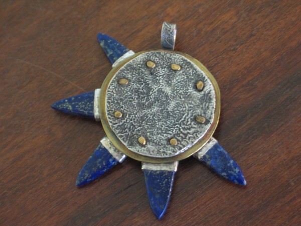 Reticulated sterling silver and  lapis pendent