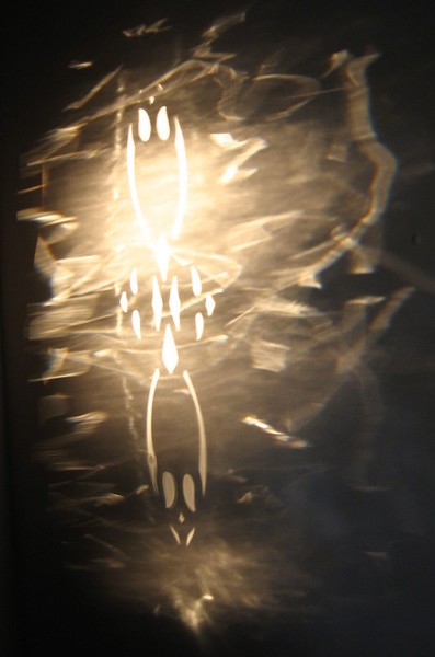 Sunlight playing  on the glass front door