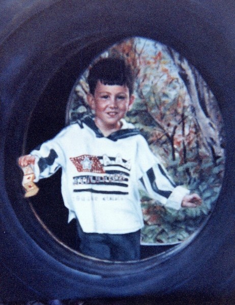Boy in tire