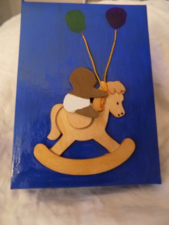Baby on a Rocking Horse