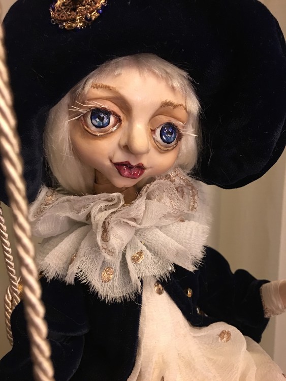 Suspended in the space doll
