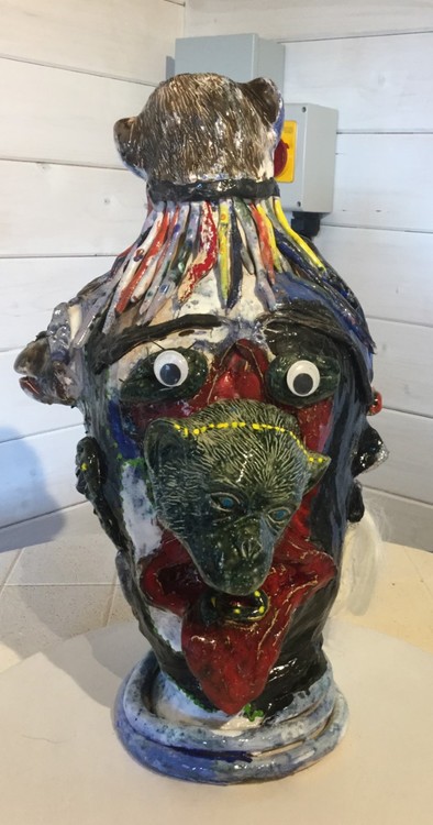 Monkey head in mixed media ceramic several faces
