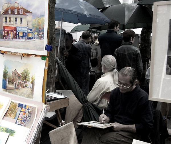 among the paintings and umbrellas...