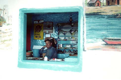 Greek man in taverna kitchen

