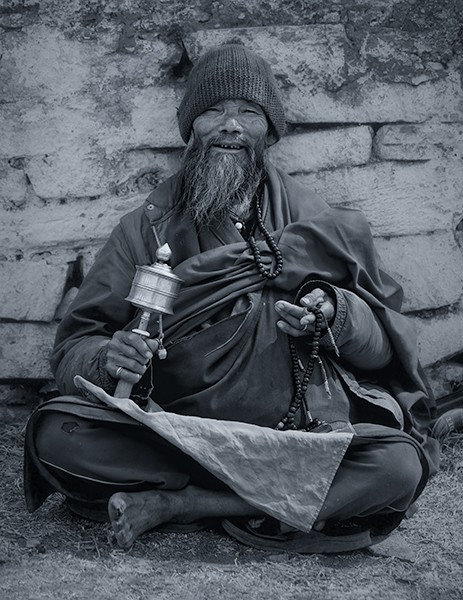 Man with Prayer Wheel