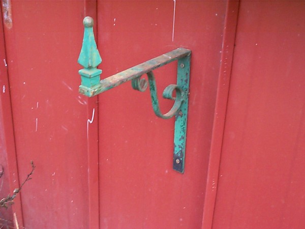 Old hanger on garden wall
