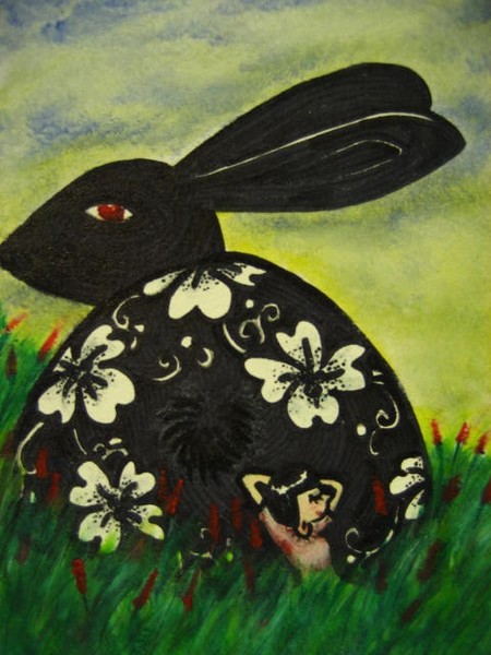 a black rabbit and a girl 