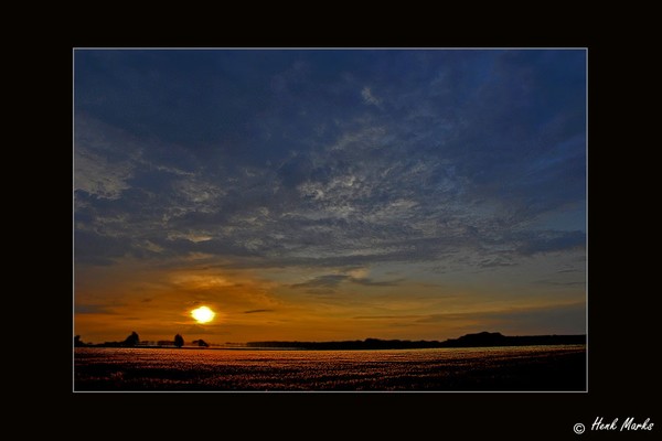 Sunset in the open field
