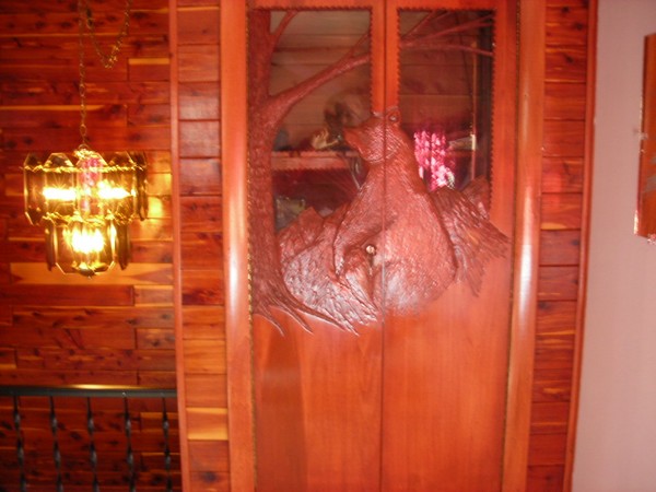 bear hand caved cabinet