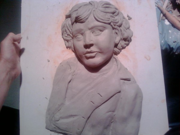 sculpture of 1920's boy clay 