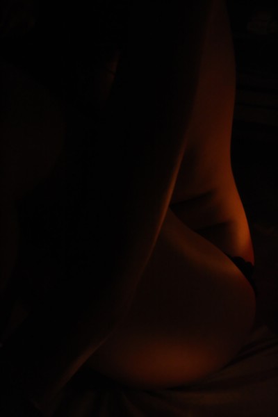 Woman's Body With Candle Light