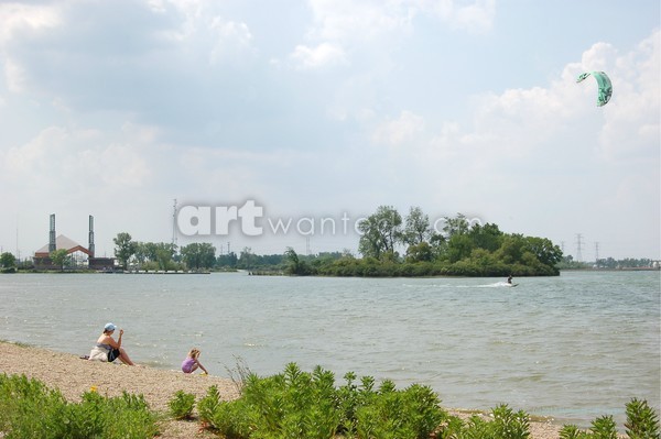 Watching a Wind Kite Sail Across Wolf Lake Photo