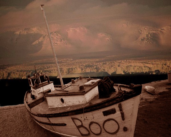 arctic  boat  superimposed on antarctic  vista
