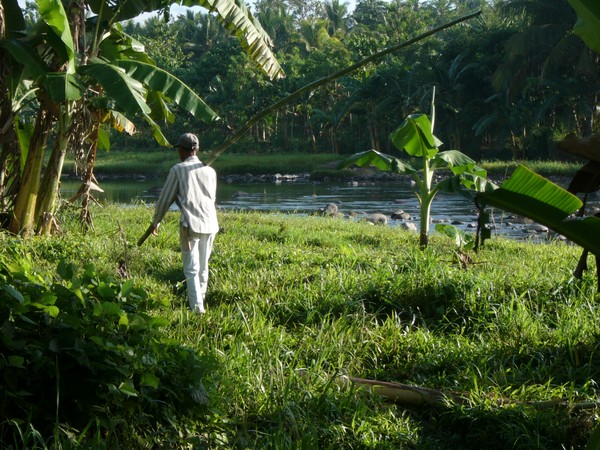 Man with a Long Bamboo Pole