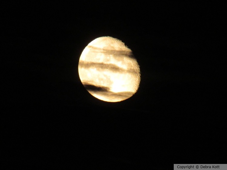 Moon with Clouds Floating By