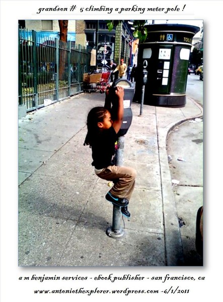 grandson Andre B climbing a parking meter pole