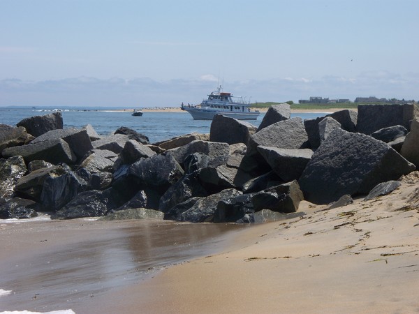 the ocean mouth behind the rocks