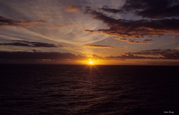 sunset over stormy sky