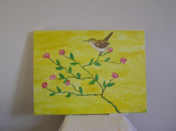 a wren on roses