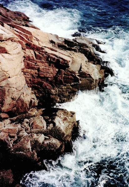 Waves Crashing into Rocks