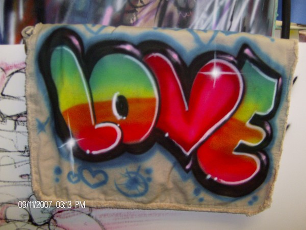 love airbrushed on bag.
