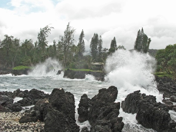 WAVES ON LAVA SHORE-LINE
