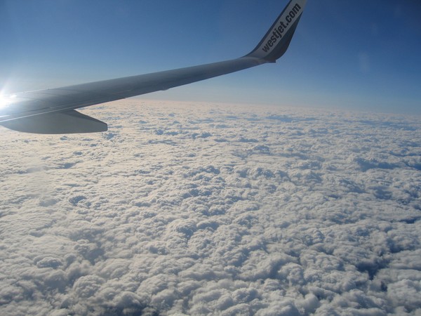 Flying Aircraft over the clouds