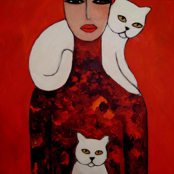 Catwoman with 2 white cats.