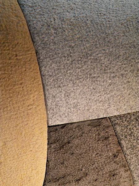 downward rotation - composition in stone