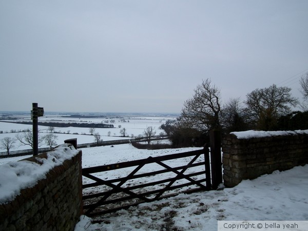 farm gate in the snow