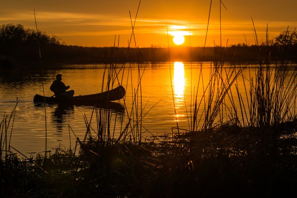 canoeing at sunset