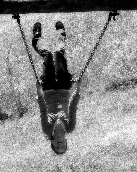 Girl on a swing, swing high