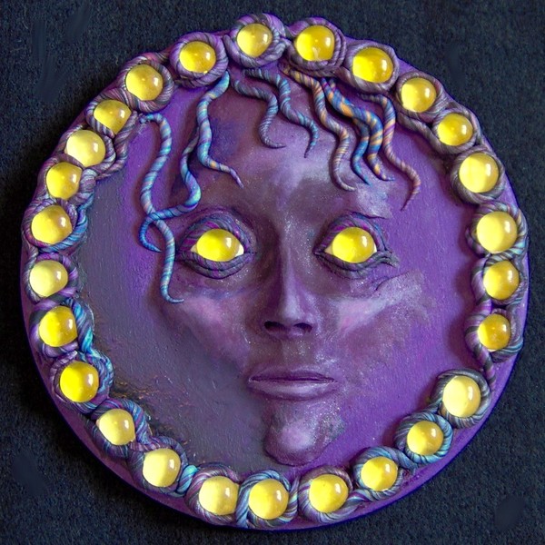 Purple And Yellow Mystic Face Sculpture