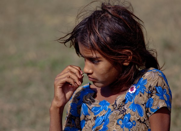 Village girl; Thol bird sanctuary, Gujarat, India