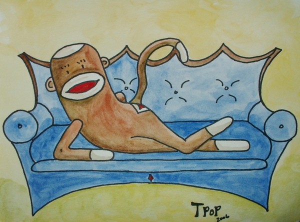 Sock Monkey on Blue Sofa